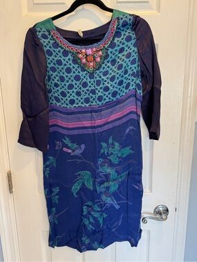 Anthropologie Bl-ink London dress with beaded neck and bird print.